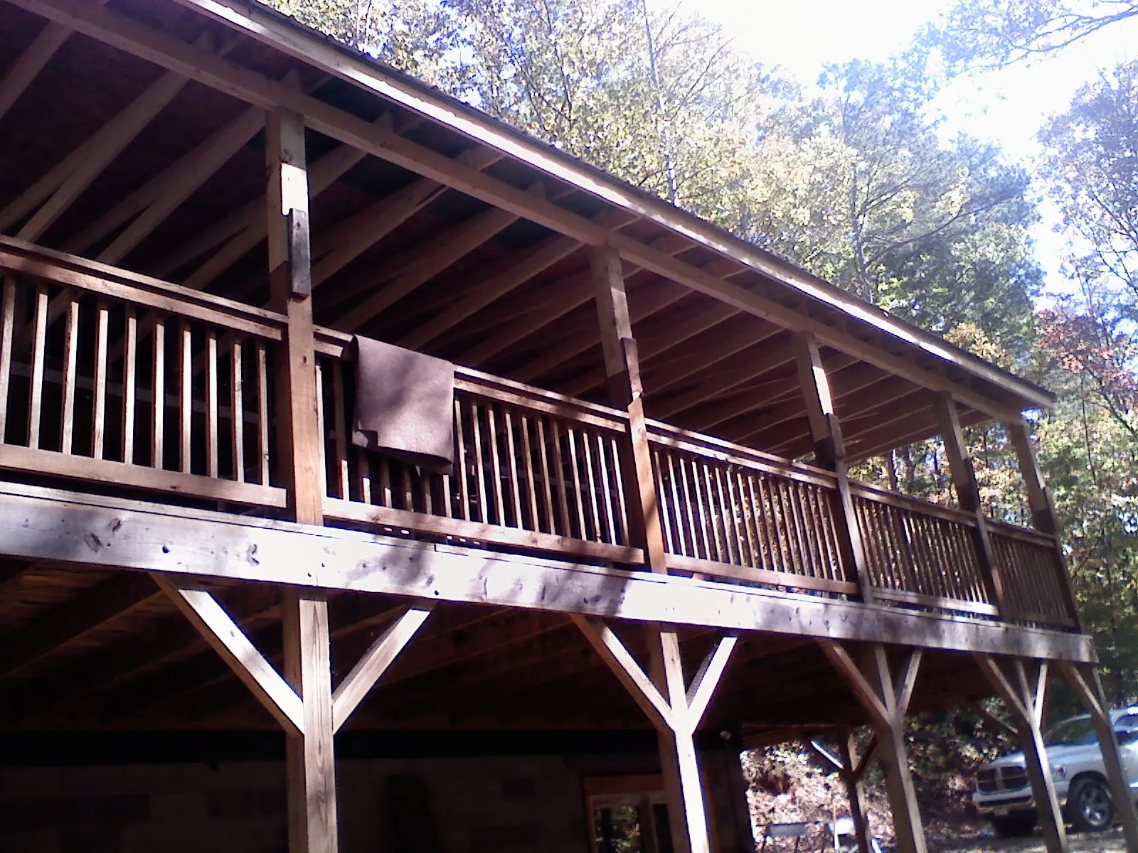 Timber framing under a new elevated porch and deck — Roof Leak Repair in Medford by Roofing Brothers